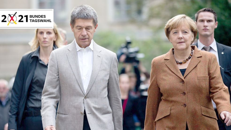 Angela Merkel und ihr Ehemann Joachim Sauer (links) – nach der Bundestagswahl dürften die beiden wieder mehr Zeit füreinander haben. Foto: Ciro De Luca/dpa