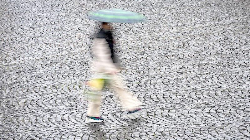 Ein regnerischer Nachmittag in Frankfurt/Main. Foto: Frank Rumpenhorst/dpa