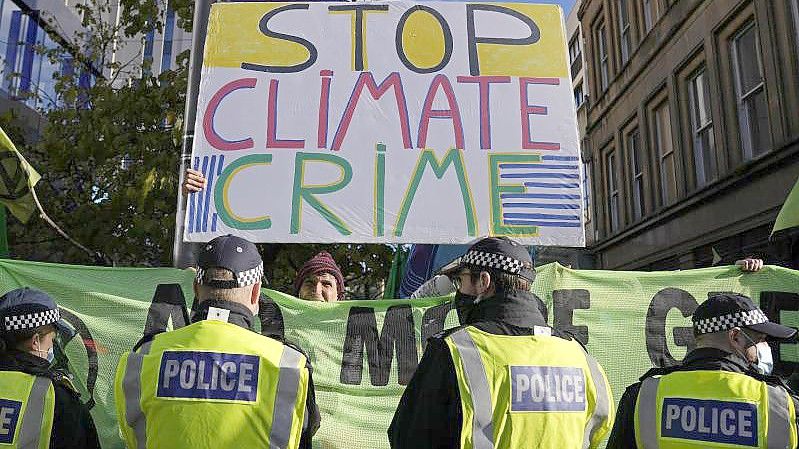 Ein Protest am Rande der COP26-Klimakonferenz in Glasgow. Symbolbild. Foto: Alastair Grant/AP/dpa