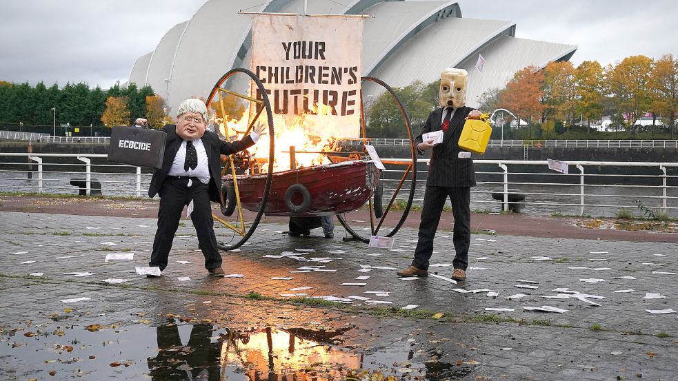 Protest im Vorfeld des Glasgow-Gipfels: Umweltaktivisten werfen der Politik vor, zu wenig gegen den Klimawandel zu tun. Foto: Andrew Milligan/imago images/ZUMA Press