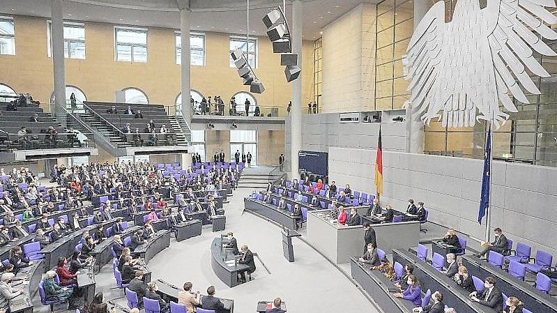 Im Bundestag fand die Vereidigung von Scholz zum Bundeskanzler und die Vereidigung der Bundesministerinnen und -minister der neuen rot-grün-gelben Bundesregierung statt. Foto: Michael Kappeler/dpa