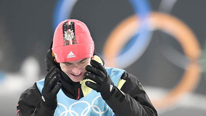 Kombinierer Vinzenz Geiger aus Deutschland gewinnt Gold bei den Winterspielen in Peking. Foto: Hendrik Schmidt/dpa