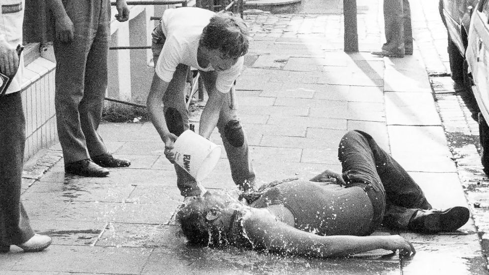 St. Pauli: Betrunkener auf der Reeperbahn, 60er Jahre. Foto: Arte/Günter Zint