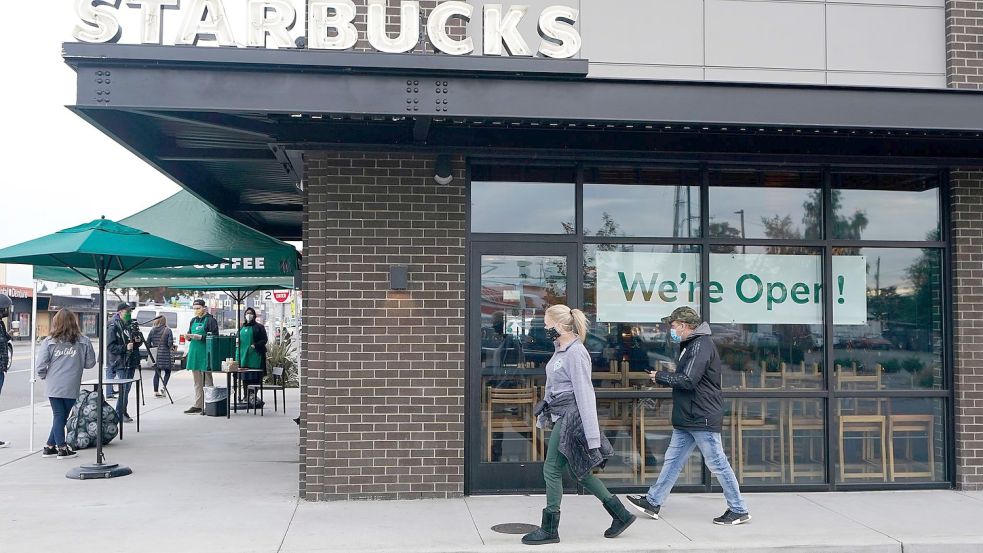 Eine Starbucks-Filiale in Seattle. Foto: Ted S. Warren/AP/dpa