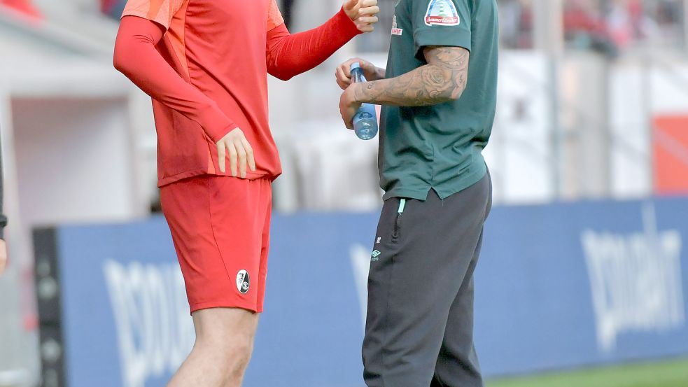 Freiburgs Michael Gregoritsch (links) und Bremens Marco Friedl treffen sich am Sonntag im Weserstadion mit ihren Teams zum Rückspiel. Im Oktober hatten die Freiburger 2:0 gewonnen. Foto: imago images/Jan Huebner