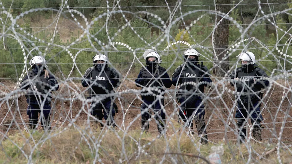 2021 riegelte Polen seine Außengrenze zu Belarus ab, um Flüchtlinge von Europa fernzuhalten. Foto: Imago Images/ITAR-TASS