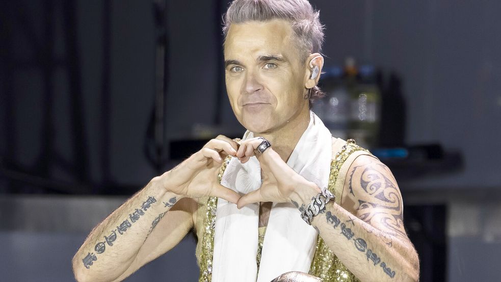 In jungen Jahren ist Robbie Williams zum Musik-Superstar geworden. Dennoch hatte er in seinem Leben viel mit seiner Alkoholsucht und Beziehungskrisen zu kämpfen. Foto: dpa/Michael Buholzer