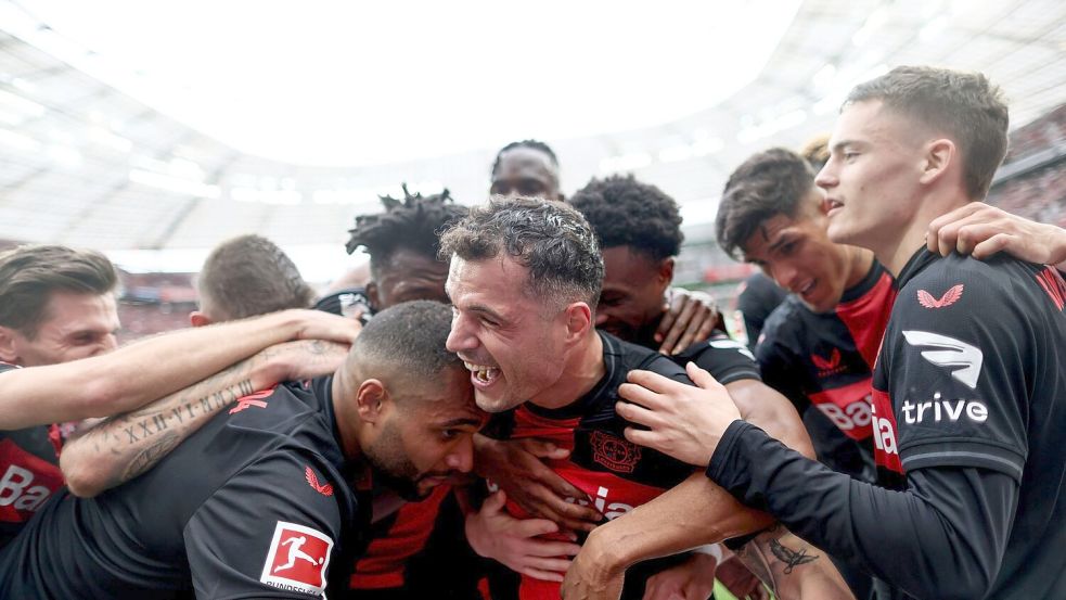 Bayer Leverkusen ist zum ersten Mal deutscher Fußball-Meister. Foto: Rolf Vennenbernd/dpa