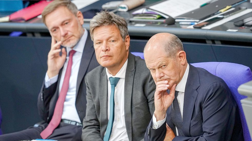 Raufen Sie sich ein letztes Mal zusammen? Bundeskanzler Olaf Scholz (von rechts), Wirtschaftsminister Robert Habeck und Finanzminister Christian Lindner. Foto: Kay Nietfeld