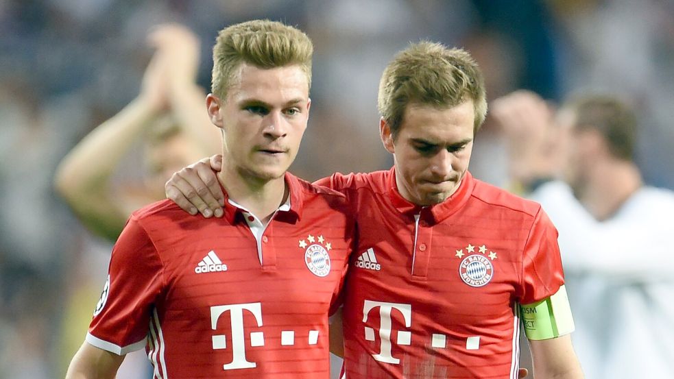 Lahm und Kimmich spielten gemeinsam für den FC Bayern. Foto: picture alliance / Andreas Gebert/dpa