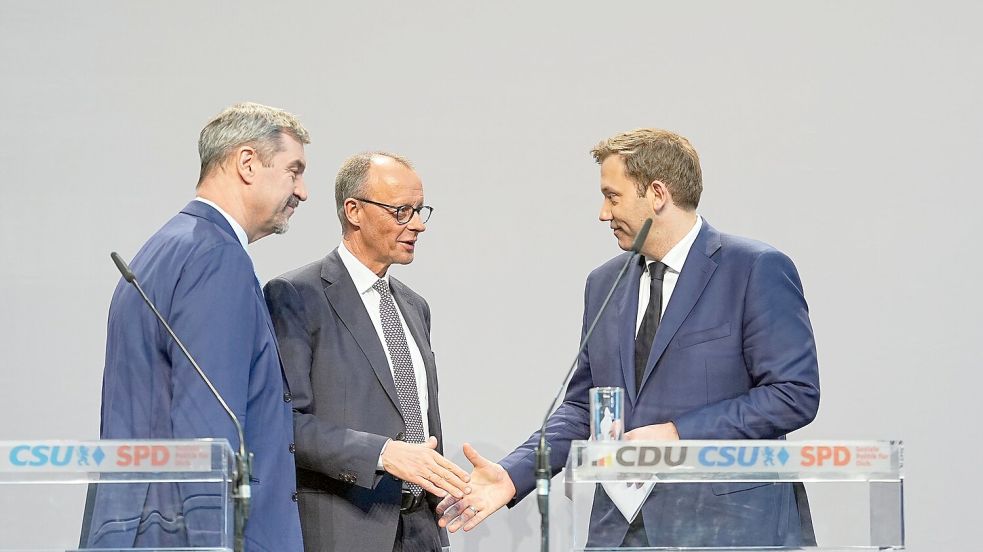 Die Parteichefs von CDU, CSU und SPD stellen den Koalitionsvertrag vor. Foto: Michael Kappeler/dpa