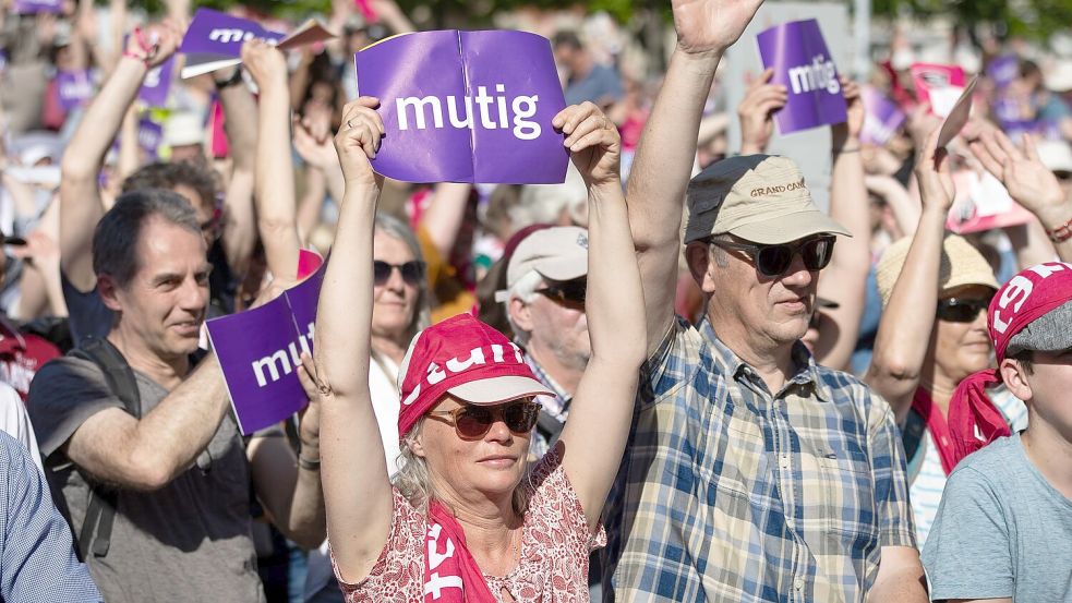 Zehntausende feierten den Kirchentag kontrovers, aber friedlich – meist bei Sonnenschein. Foto: Moritz Frankenberg/dpa