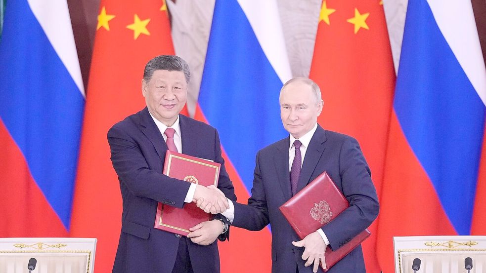 Putin und Xi bekräftigen Partnerschaft. Foto: Pavel Bednyakov/AP/dpa