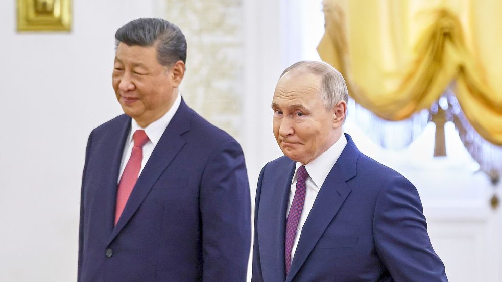 Zufriedene Gesichter bei Xi und Putin. Foto: Evgenia Novozhenina/Pool Reurers/AP/dpa