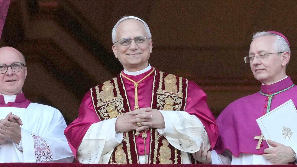 Weltweit reagierten Staatsoberhäupter auf die Wahl Prevosts zum neuen Papst. Foto: Andrew Medichini/AP/dpa