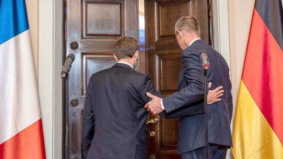 Merz deutet bei Macron-Besuch mögliche Einigung im Zollstreit an Foto: Michael Kappeler/dpa