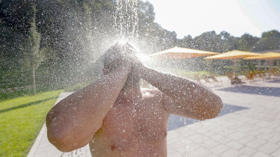 Erfrischung - hochwillkommen bei bis zu 38 Grad. Foto: Thomas Warnack/dpa