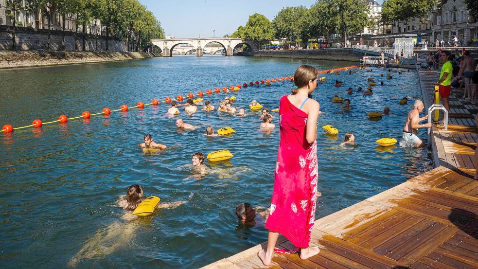 Wieder in der Seine schwimmen zu können, war ein lange gehegter Wunsch der Menschen in Paris (Archivbild). Foto: Dimitar Dilkoff/AFP/dpa