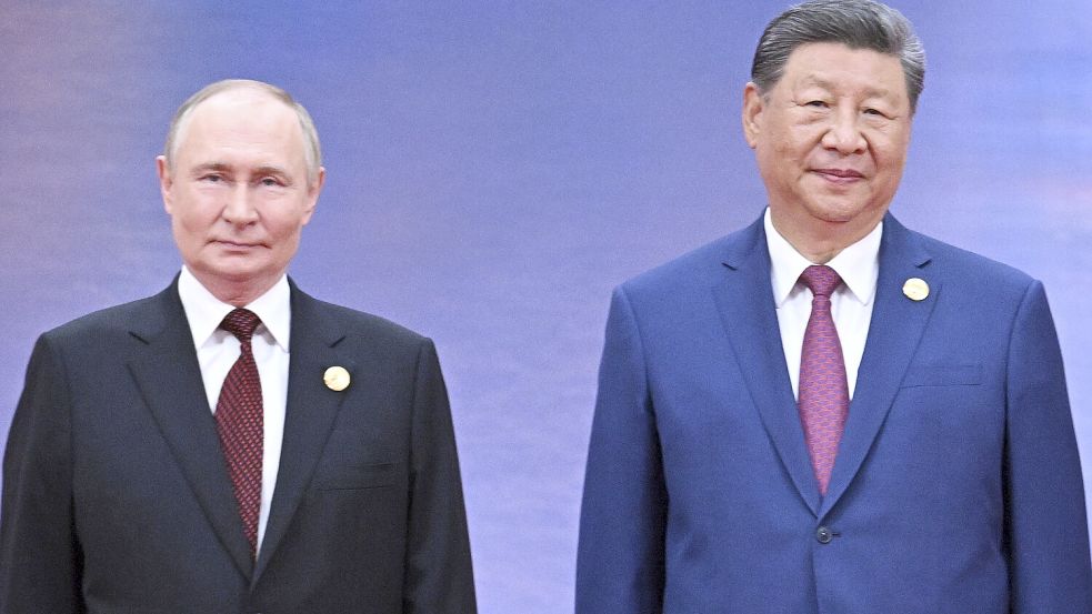 Beim SOZ-Gipfel in China: Russlands Präsident Wladimir Putin (l.) mit Chinas Staatschef Xi Jinping. Foto: dpa/Sergei Bobylev