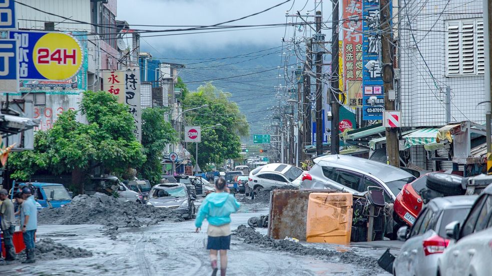 In Taiwan lief ein Staudamm über, was zu schweren Schäden und Todesopfern führte. Foto: Cheng-Chia Huang