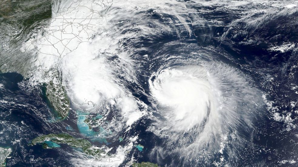 Die Hurrikane „Humberto“ und „Imelda“ wirbeln durch den Nordatlantik. Foto: Uncredited/NASA Worldview/AP/dpa