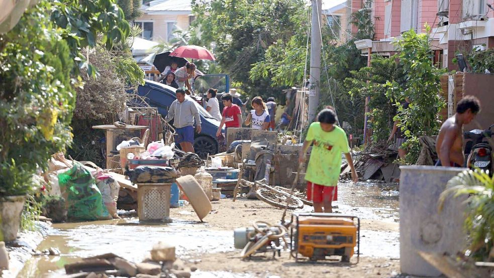 Viele Menschen haben in den Schlamm- und Wassermassen alles verloren. Foto: Jacqueline Hernandez/AP/dpa