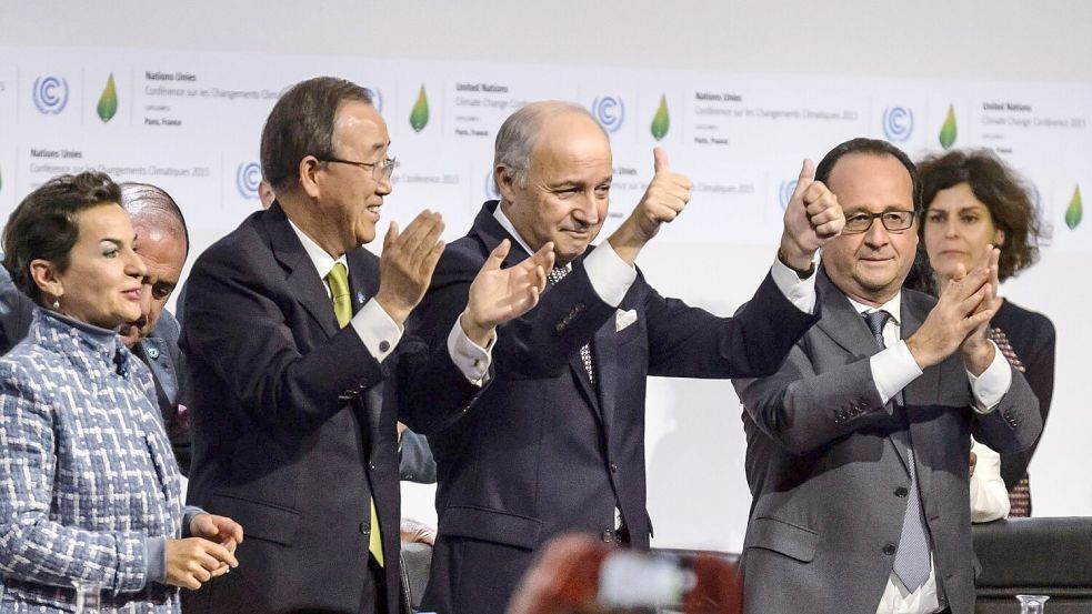 Der Jubel 2015 in Paris war groß: Die Welt hatte sich auf den Kampf gegen die Klimakrise geeinigt - und darauf die Erderwärmung möglichst auf 1,5 Grad zu begrenzen. (Archivbild) Foto: Christophe Petit Tesson