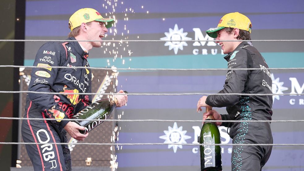 Eine Fahrt von Max Verstappen (l) für den Titel Weltmeister der Herzen. Foto: Ettore Chiereguini/AP/dpa