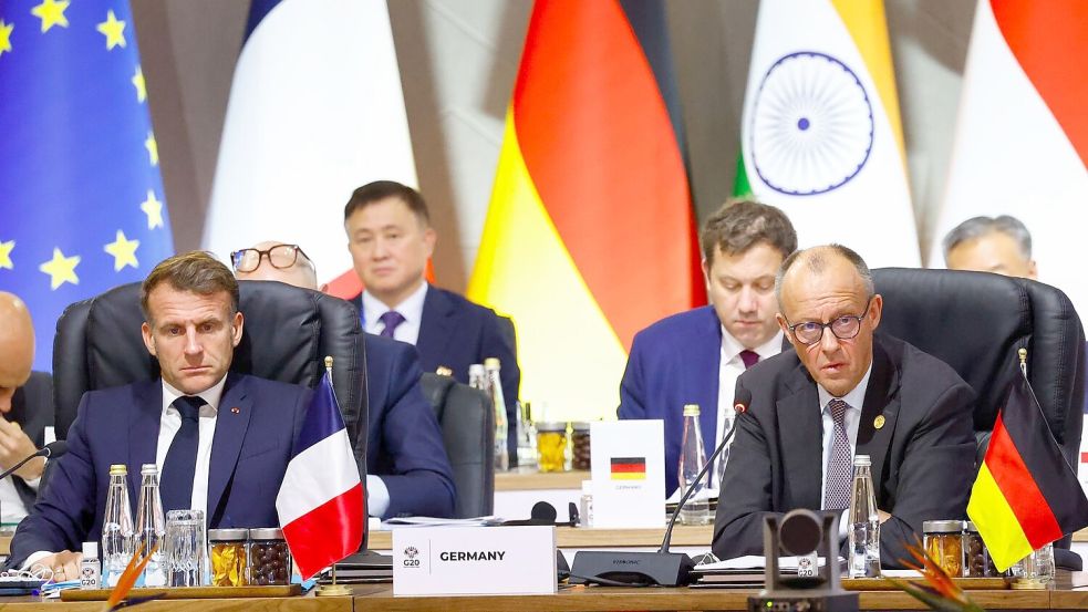 Keine erzwungene Kapitulation: Der französische Präsident Emmanuel Macron und Kanzler Friedrich Merz wollen versuchen, das Schlimmste zu verhindern. Foto: Thomas Mukoya/Pool Reuters/AP/dp