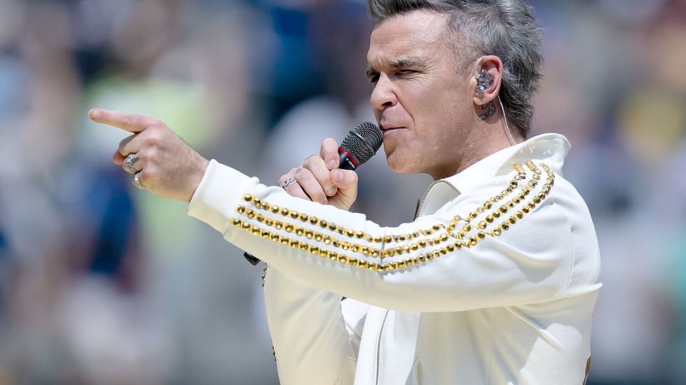 Wie beim Finale der Club-WM tritt auch Robbie Williams wieder auf. (Archivbild) Foto: Sven Hoppe