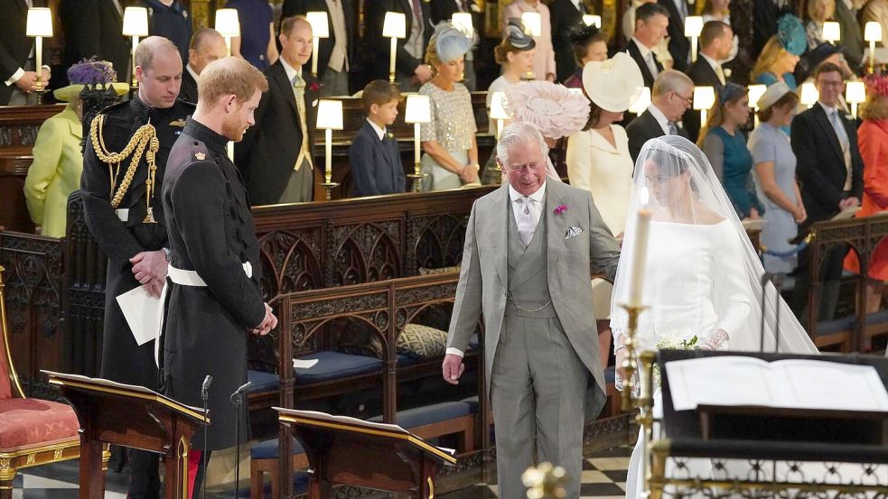 Charles führte Meghan zum Altar. (Archivbild) Foto: Jonathan Brady/PA Wire/dpa