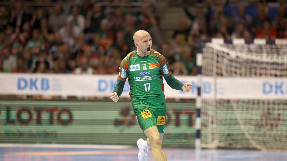 Der SC Magdeburg bejubelt die deutsche Meisterschaft. Foto: Jan Woitas/dpa