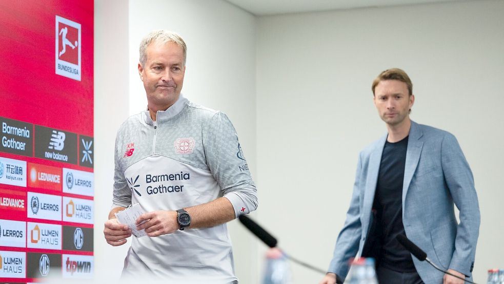 Zusammenarbeit endet: Hjulmand und Bayers Sportchef Rolfes. Foto: Marius Becker