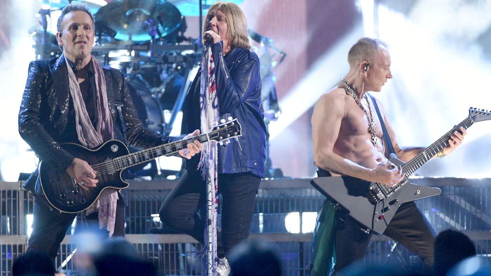 Def Leppard spielen in diesem Sommer erstmals beim Heavy-Metal-Festival Wacken Open Air Foto: Evan Agostini/Invision/AP/dpa
