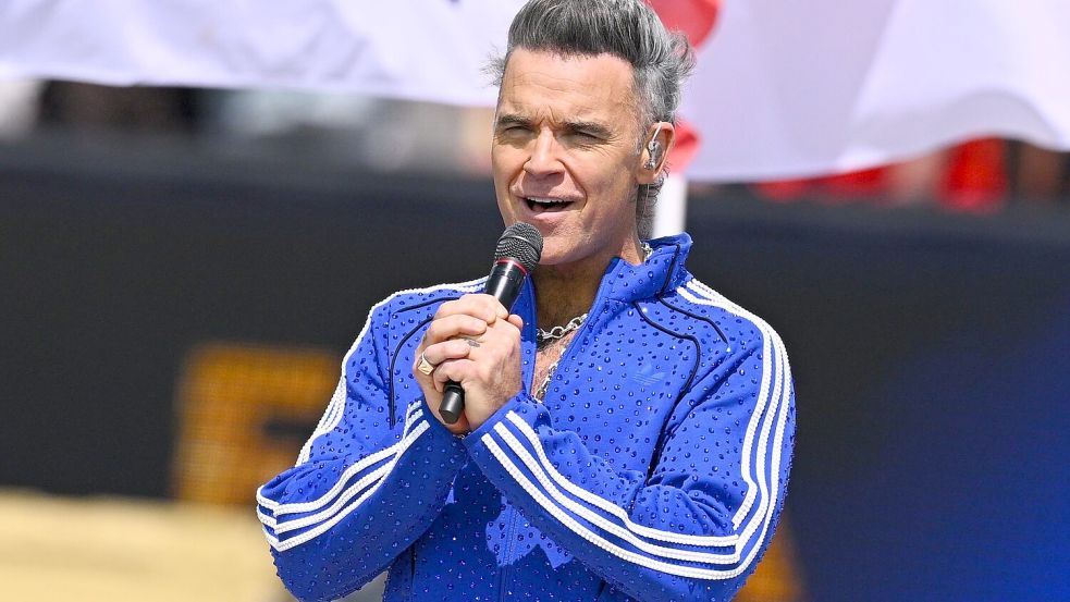 Popikone Robbie Williams zeigte sich als großer Klopp-Fan. Foto: Tom Weller/dpa
