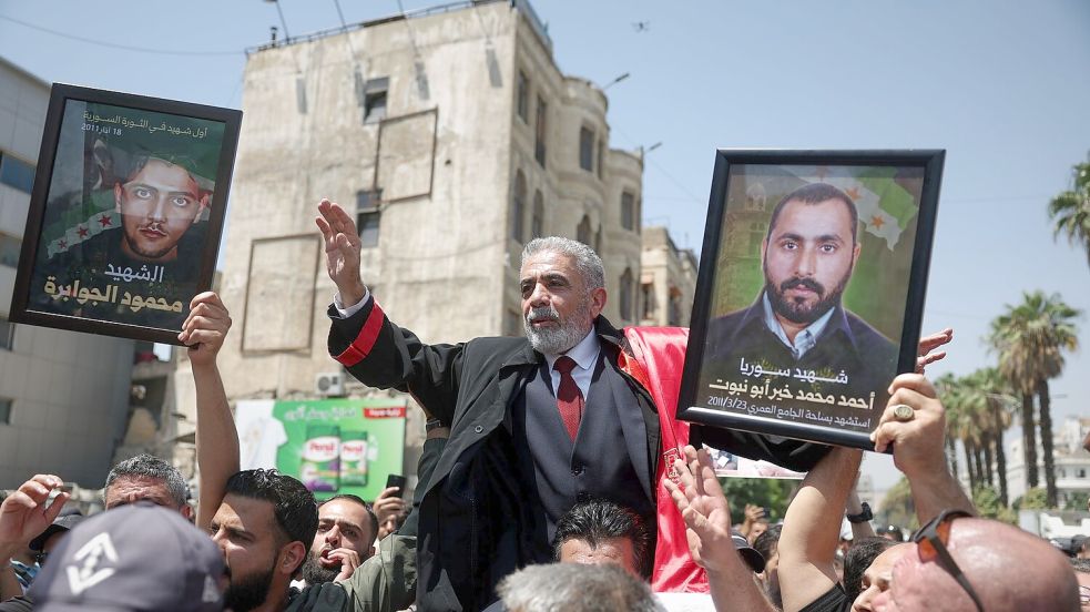 Nach dem Urteil gegen Nadschib kam es zu Jubel und Freudenschreien. Foto: Ghaith Alsayed