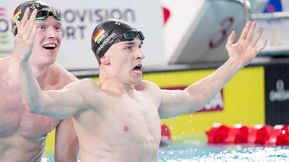 Jubel im Doppelpack: Liebmann (r) und Schwarz freuen sich. Foto: Sebastien Bozon/AFP/dpa