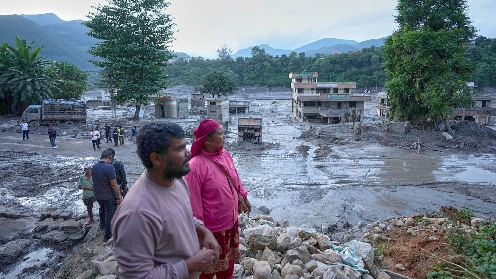 Die Sturzflut hatte entlang eines Flusslaufs schwere Schäden angerichtet. Foto: Rajesh Kumar Singh