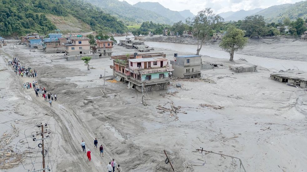 Augenzeugen berichteten, dass ganze Dörfer weggespült wurden. Foto: Sulav Shrestha/XinHua/dpa