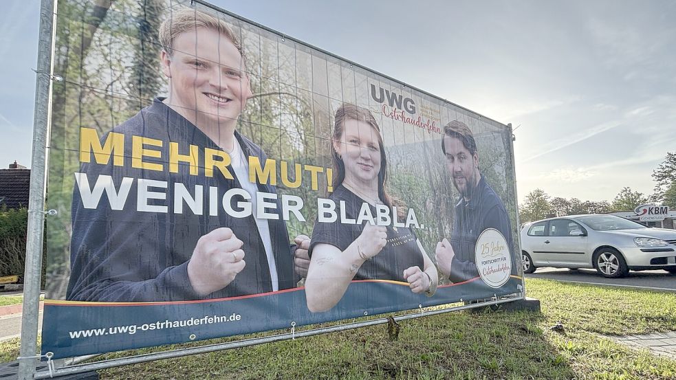 Die UWG mit ihrer Vorsitzenden Karina Behrens (auf dem Plakat in der Mitte) ist die Gewinnerin der Gemeinderatswahl in Ostrhauderfehn. Foto: Henrik Zein