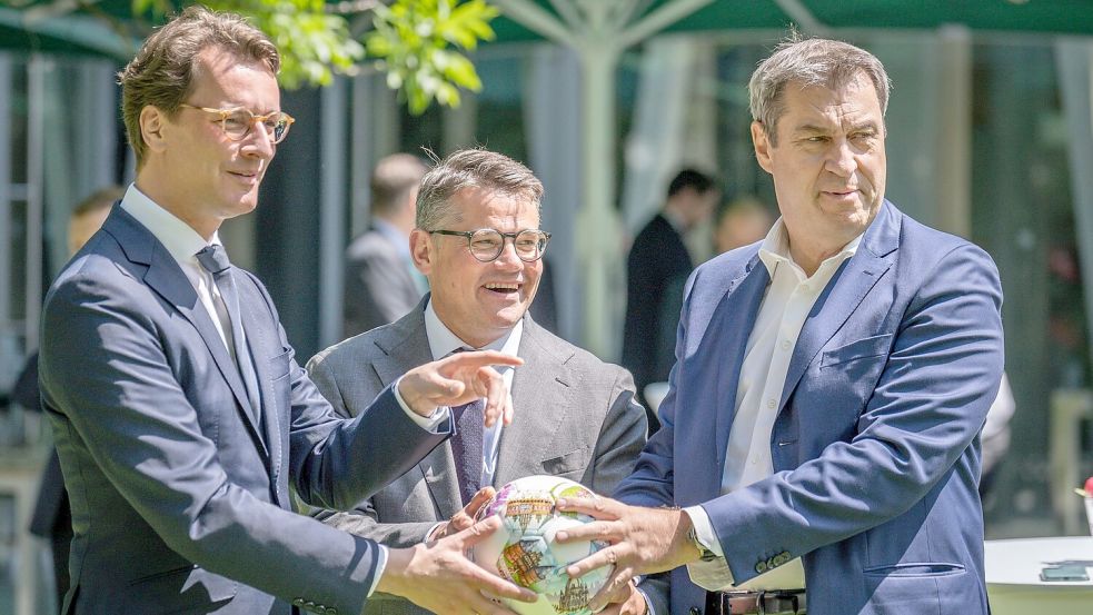 Hendrik Wüst, Boris Rhein und Markus Söder: Diese drei Ministerpräsidenten werden für die Nachfolge von Merz gehandelt. (Archivbild) Foto: Michael Kappeler/dpa