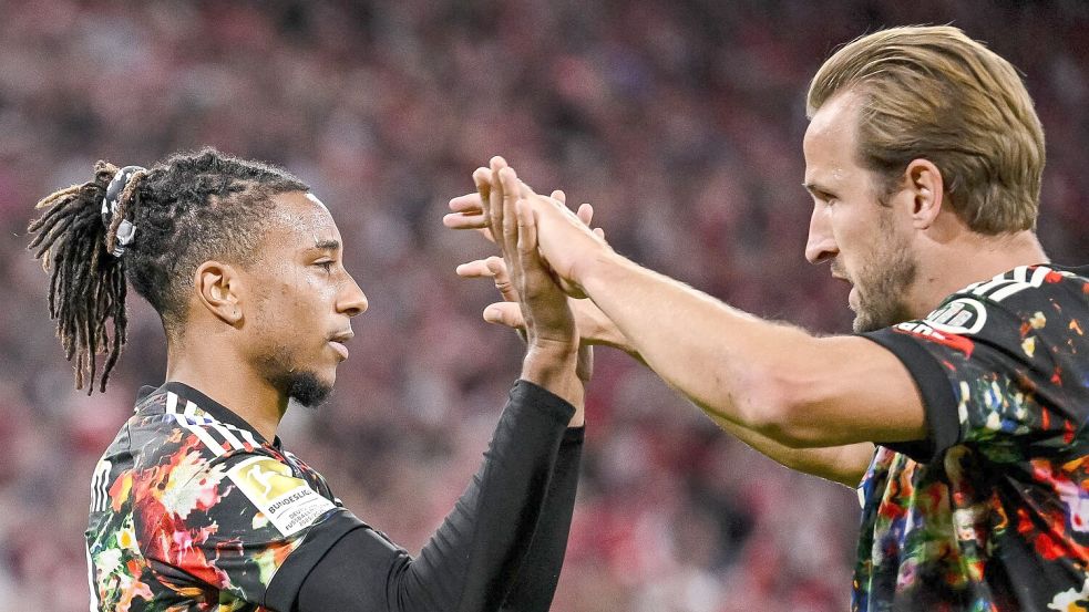 Zwei für den Ballon d’Or: Das Fünf-Tore-Duo Michael Olise (l) und Harry Kane. Foto: Harry Langer/dpa