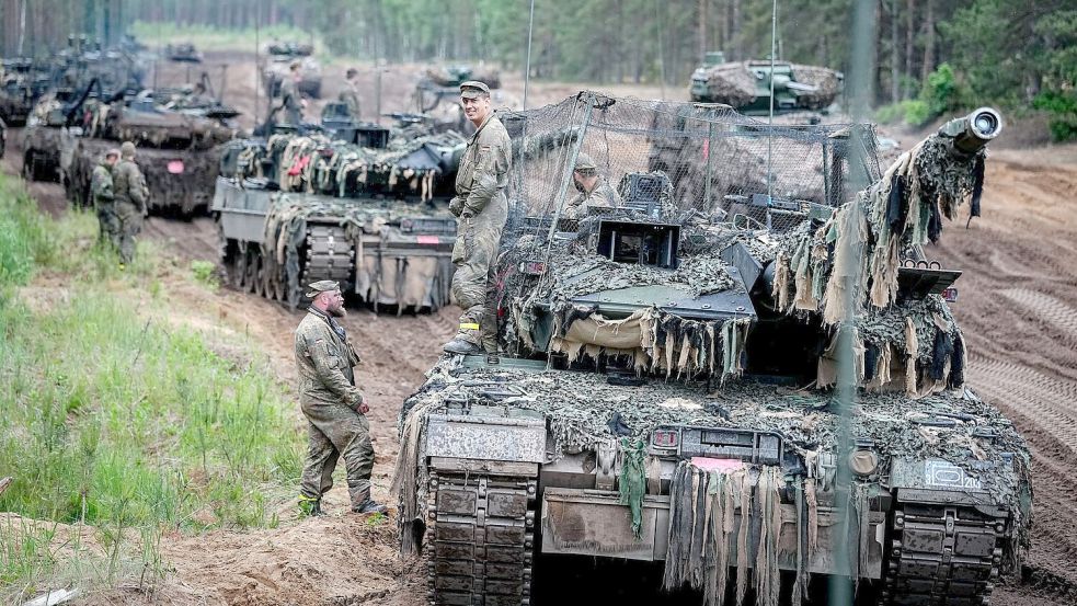 Bundeswehr-Panzer bei einer Übung in Litauen. Die Satellitenaufnahmen sollen auch der deutschen Brigade in dem baltischen Land helfen.  Foto: Kay Nietfeld/dpa